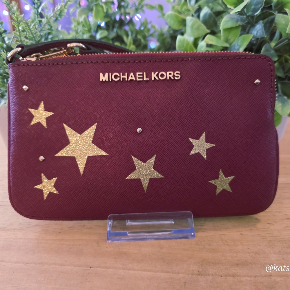 MichaelKors Maroon Wristlet with Gold Stars